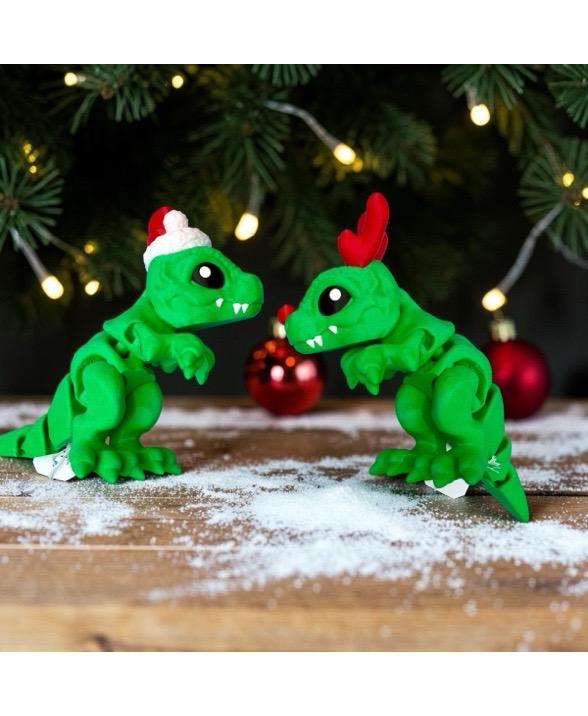 Articulated Christmas T-Rex with reindeer antlers and red nose, 3D printed in the UK.