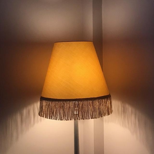 An extra large gold fringed lampshade made to order.