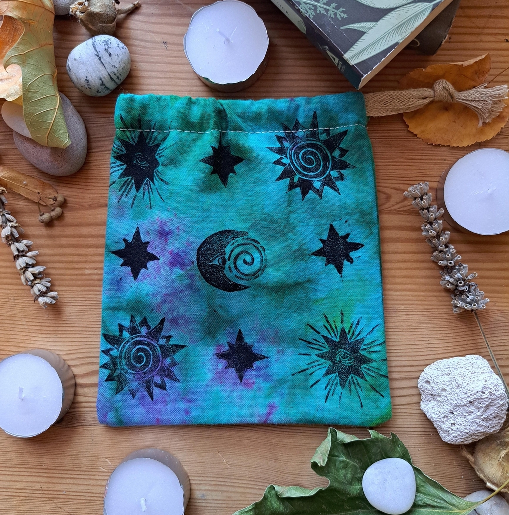 Handmade spell bags for herbs, crystals, charms, and tiny rituals. Each bag is dyed, printed, and sewn slowly, carrying its own quiet magic.