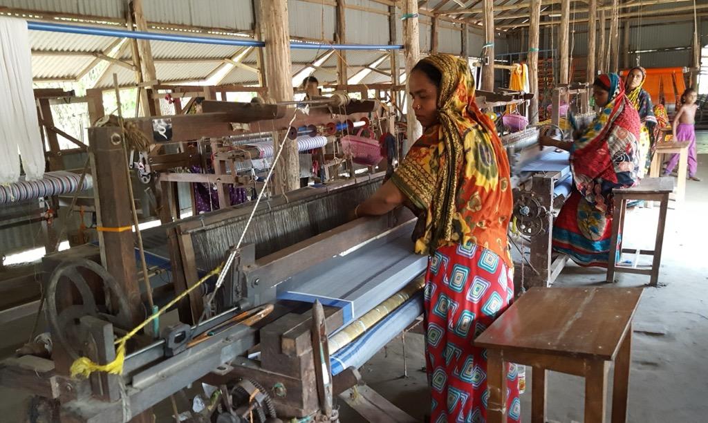 char women at weaving loom