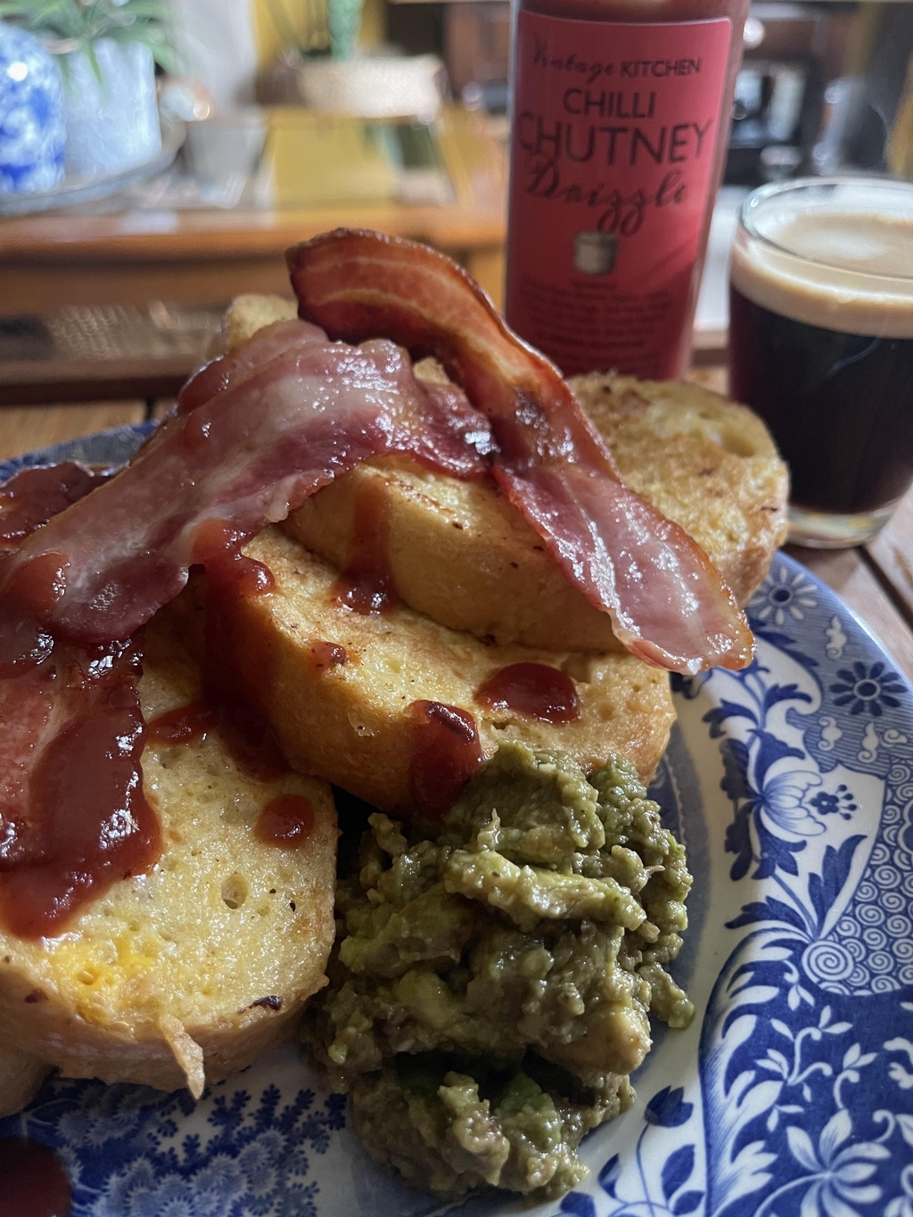 Vintage Kitchen Chilli Chutney Drizzle served with French Toast, Crispy Bacon and smashed avocado 