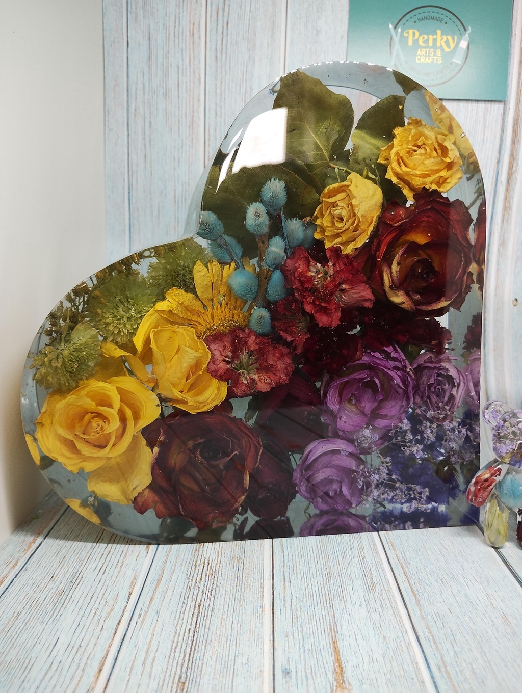 Memorial flowers dried and set in clear resin