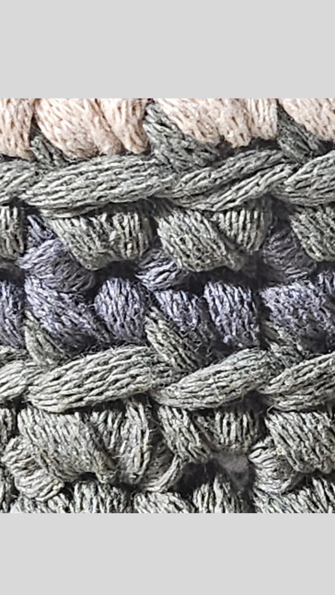 Fibre-art process study by GlySta Studio showing layered crochet texture and sculptural textile construction during development.