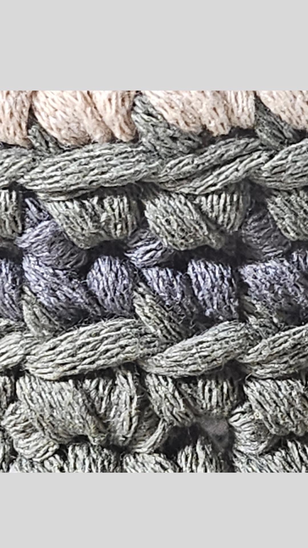Fibre-art process study by GlySta Studio showing layered crochet texture and sculptural textile construction during development.