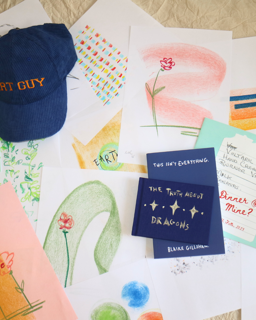 An Assortment of Drawings, Books and an Art Guy Hat by @Befmakes.