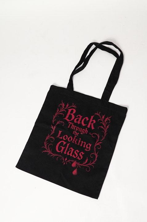 Gothic Wonderland accessories including Frumious Bandersnatch keyrings, badges, tote bags and postcards inspired by Dark Alice