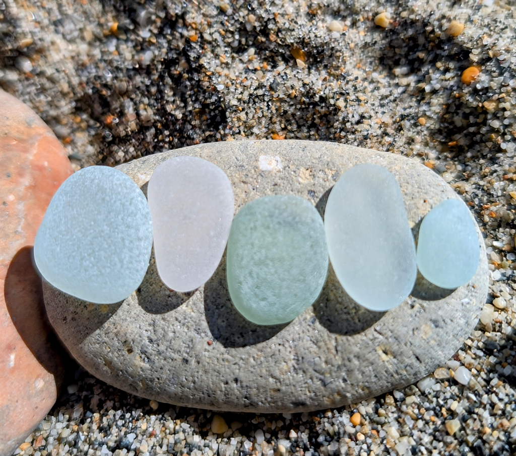 Perfectly tumbled sea glass found on Marazion beach, Cornwall.