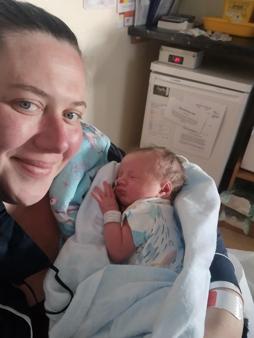 Sally holding her newborn daughter