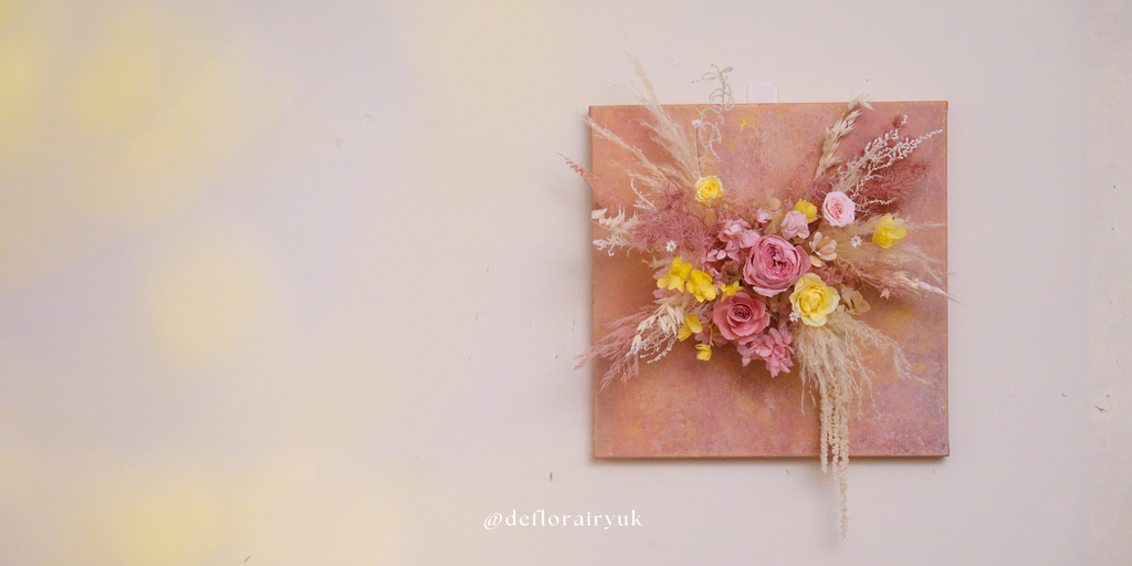 Handcrafted 3D flower canvas blends real flowers with textured artistry.