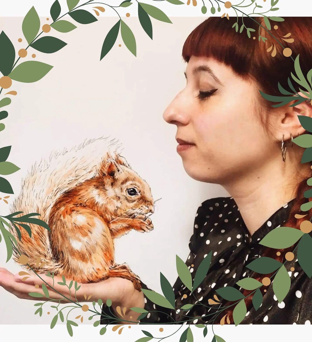 Photo of a woman holding a red squirrel illustration on her hand, as if it was a real squirrel. The scene is surrounded by drawn on green leaves.