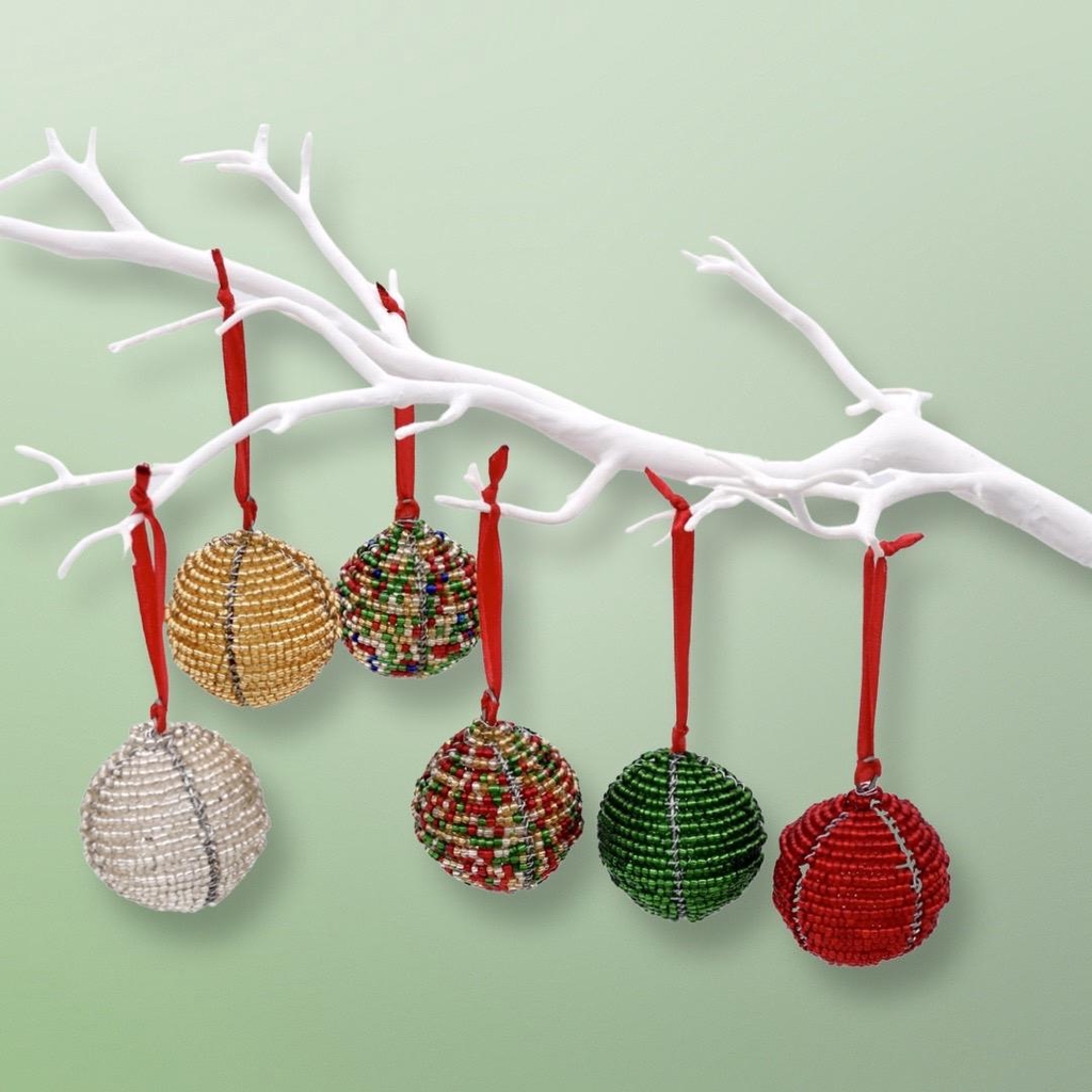 Celebrate the season with our handmade Christmas ornaments, crafted to bring warmth, tradition, and a touch of African-inspired charm to your festive décor. Each piece is thoughtfully designed using natural and vibrant materials, making your tree and home uniquely joyful. Perfect as keepsakes or thoughtful gifts, our ornaments add a personal, handmade sparkle to your holiday celebrations.
