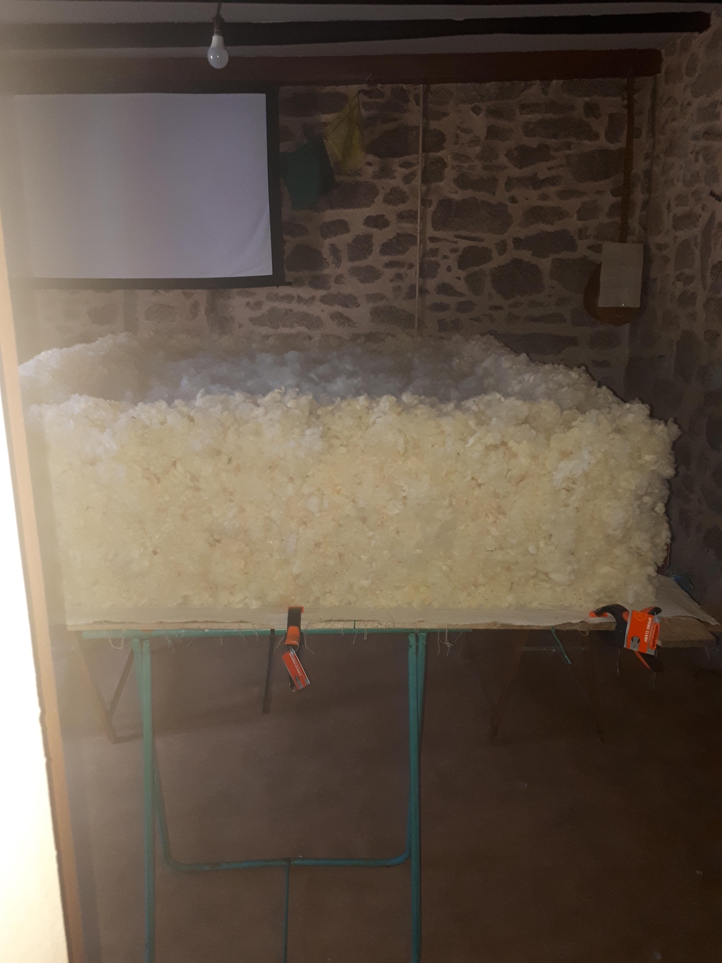 pose de laine d'un matelas