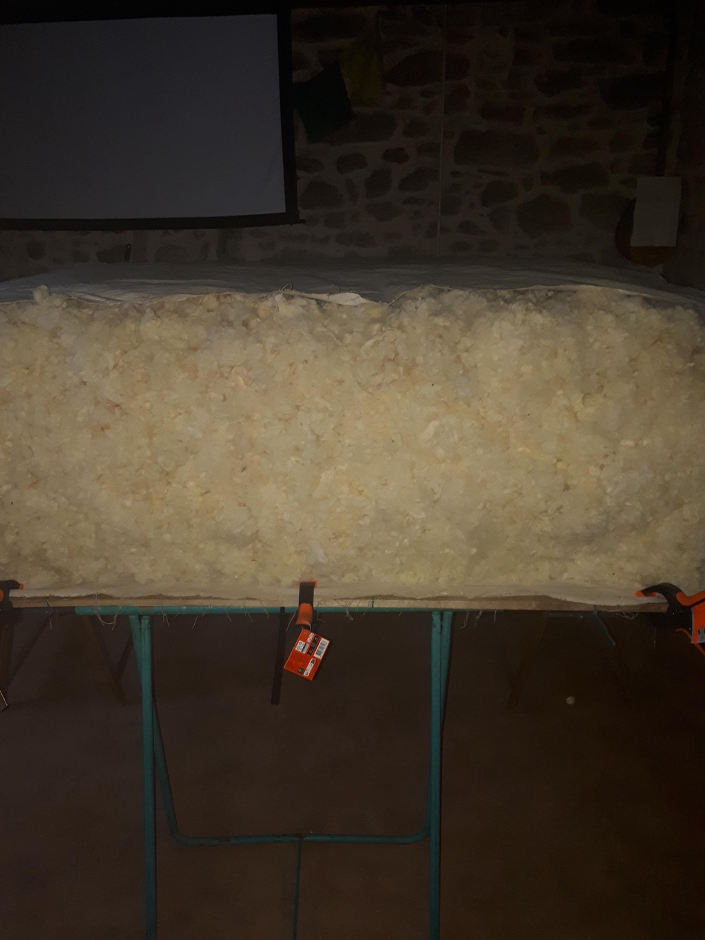 pose de laine d'un matelas