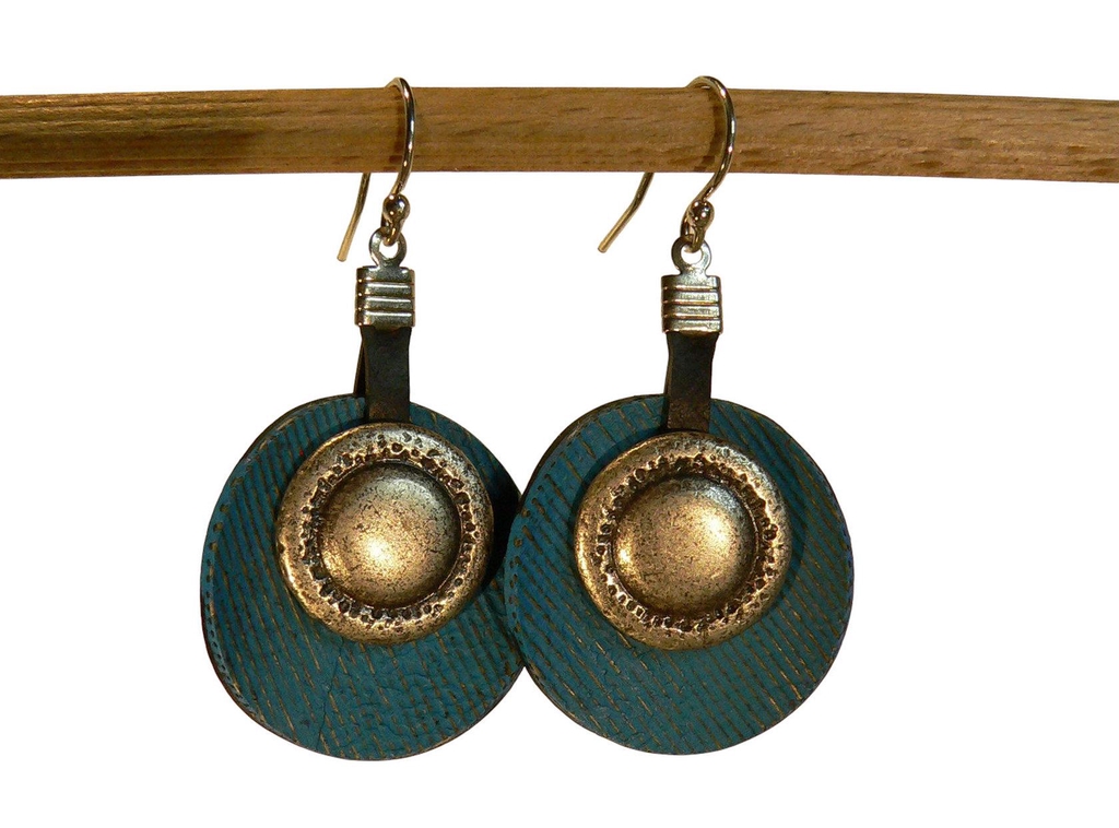 Les boucles d'oreilles d'Atataye