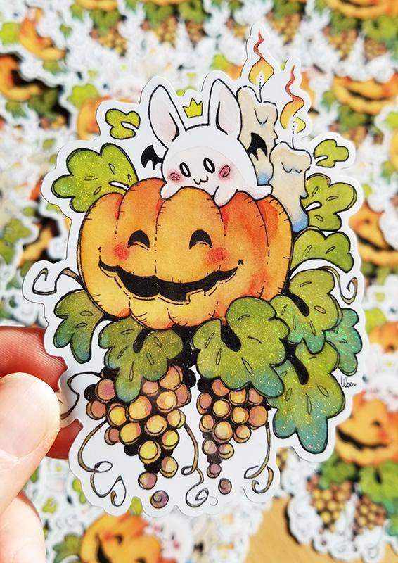 Tous les stickers illustrés par Libou, visuel d'une citrouille d'halloween avec une chauve souris blanche