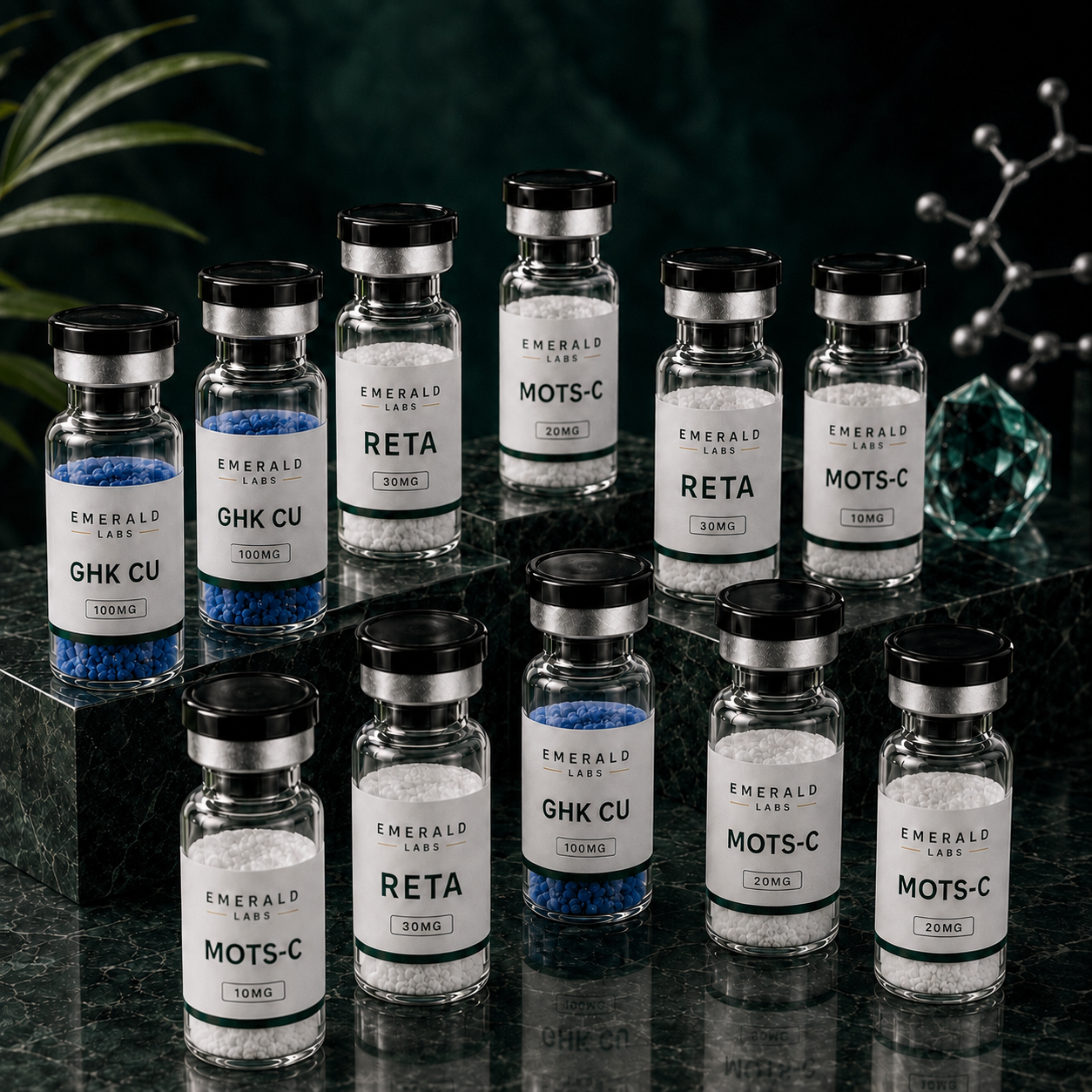 Emerald Labs research peptide vials including Reta 30mg, GHK-CU 100mg and MOTS-C