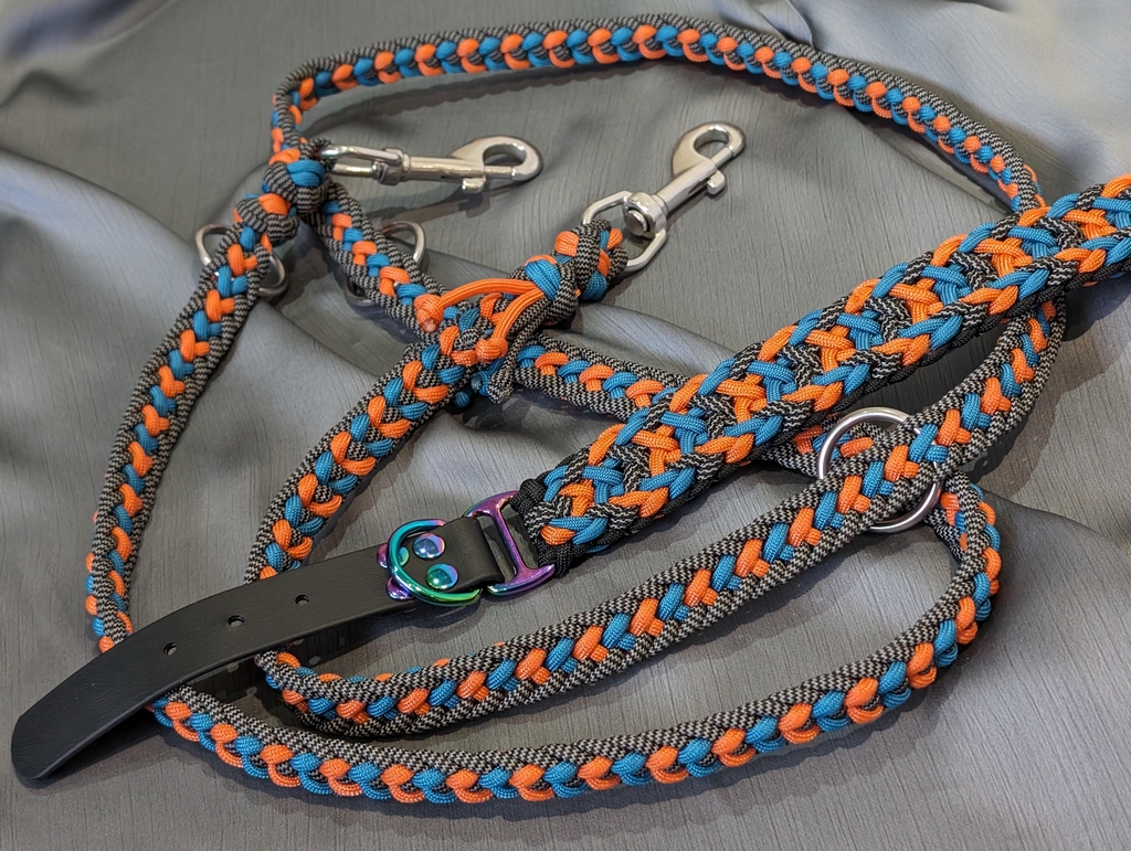 Paracord dog collar and leash in orange, blue and black reflective