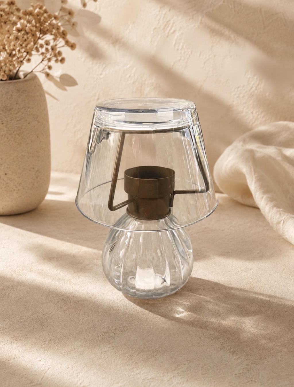 This gorgeous Tea Light Lamp will add a touch of elegance to any room.