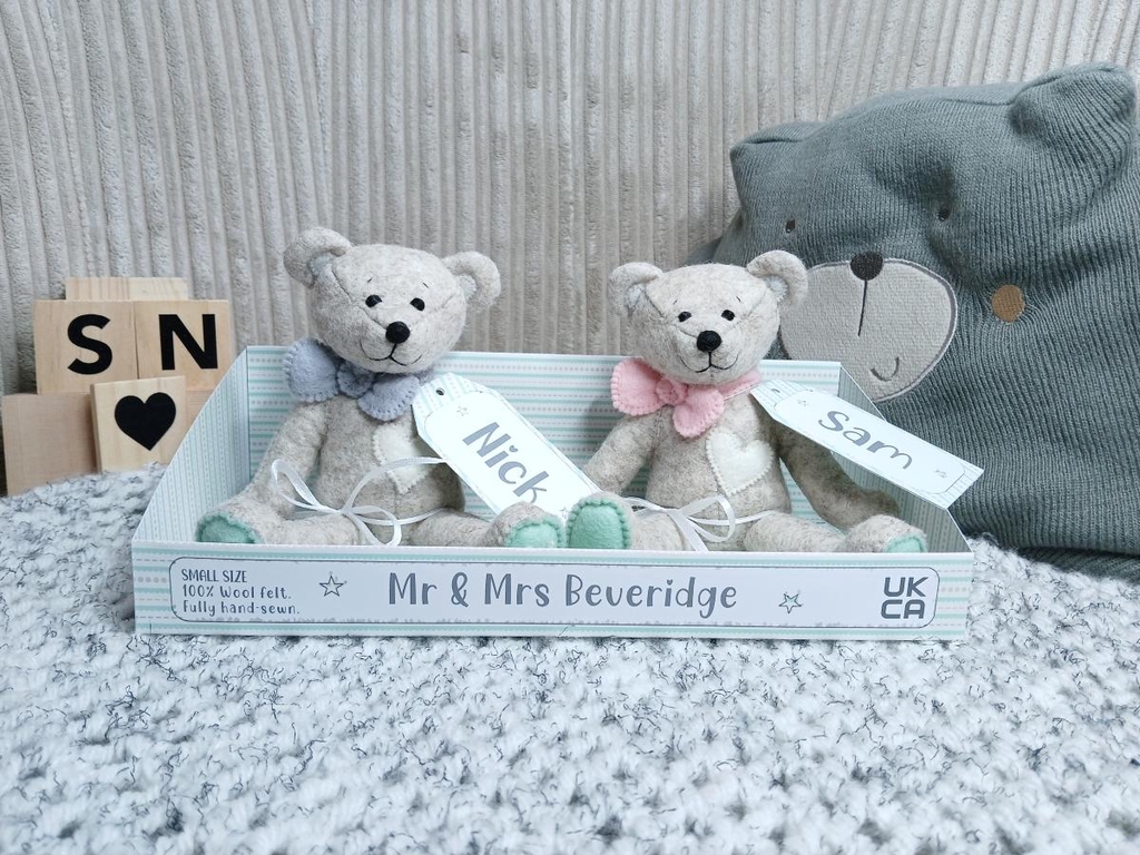 A Bride and Groom Bear sat in a 'sharing' tray. Nick and Sam are the Bears names. Mr & Mrs Beveridge is written on the tray.