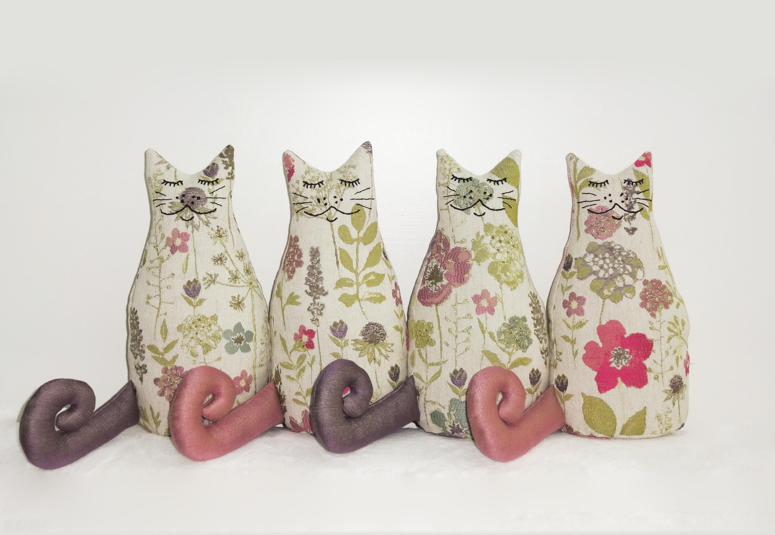Cat doorstops and bookends
