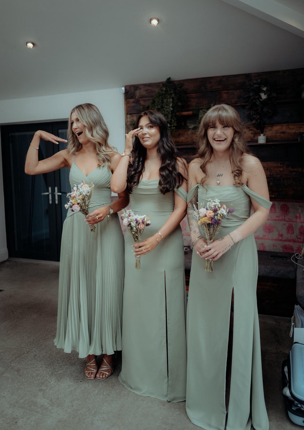 Bridesmaids holding their dried flower bouquets