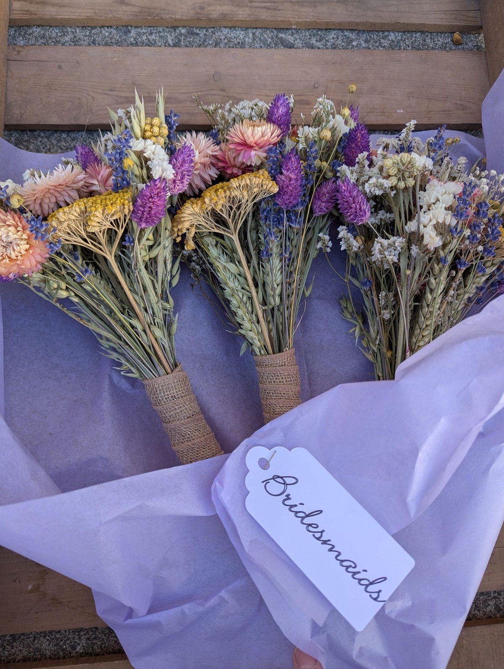 Dried flower bridesmaid bouquets in tissue paper