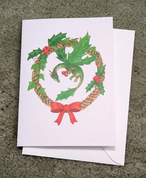 Holly Wreath dragon greetings card.