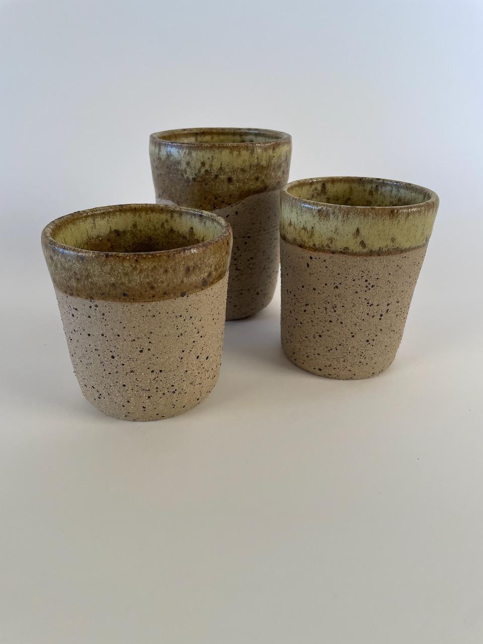 Lavafleck beakers with oatmeal glaze on the inside and around the rim.