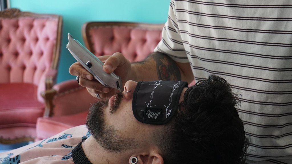 WHERE MEN GET THEIR HAIR CUT