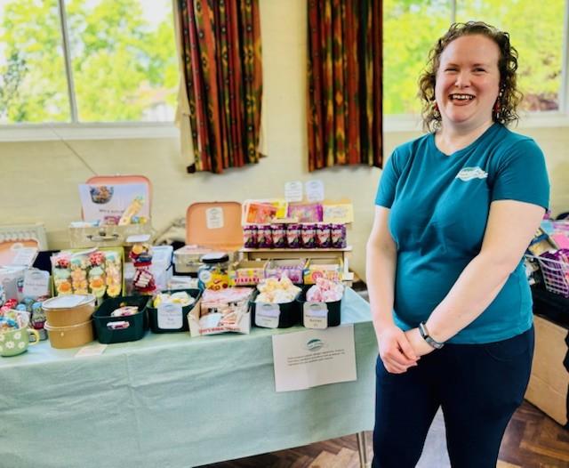 Picture of Emma selling sweets