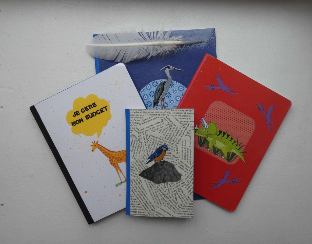 Cette image présente 4 carnets uniques et décoré à la main dans le canton de Vaud en Suisse.