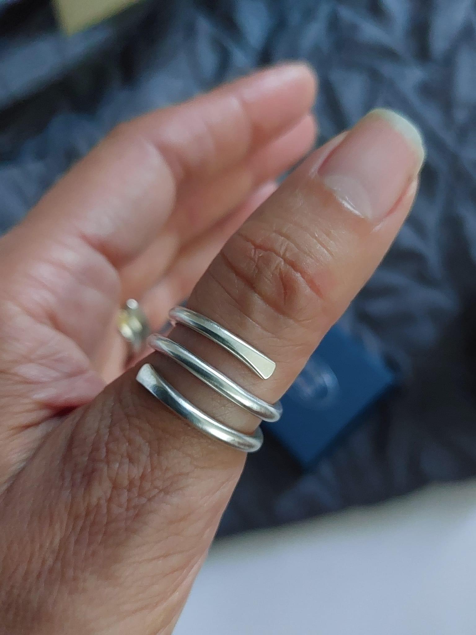 Picture of a flared silver chunky ring by Sleek Silver Jewellery commissioned by customer