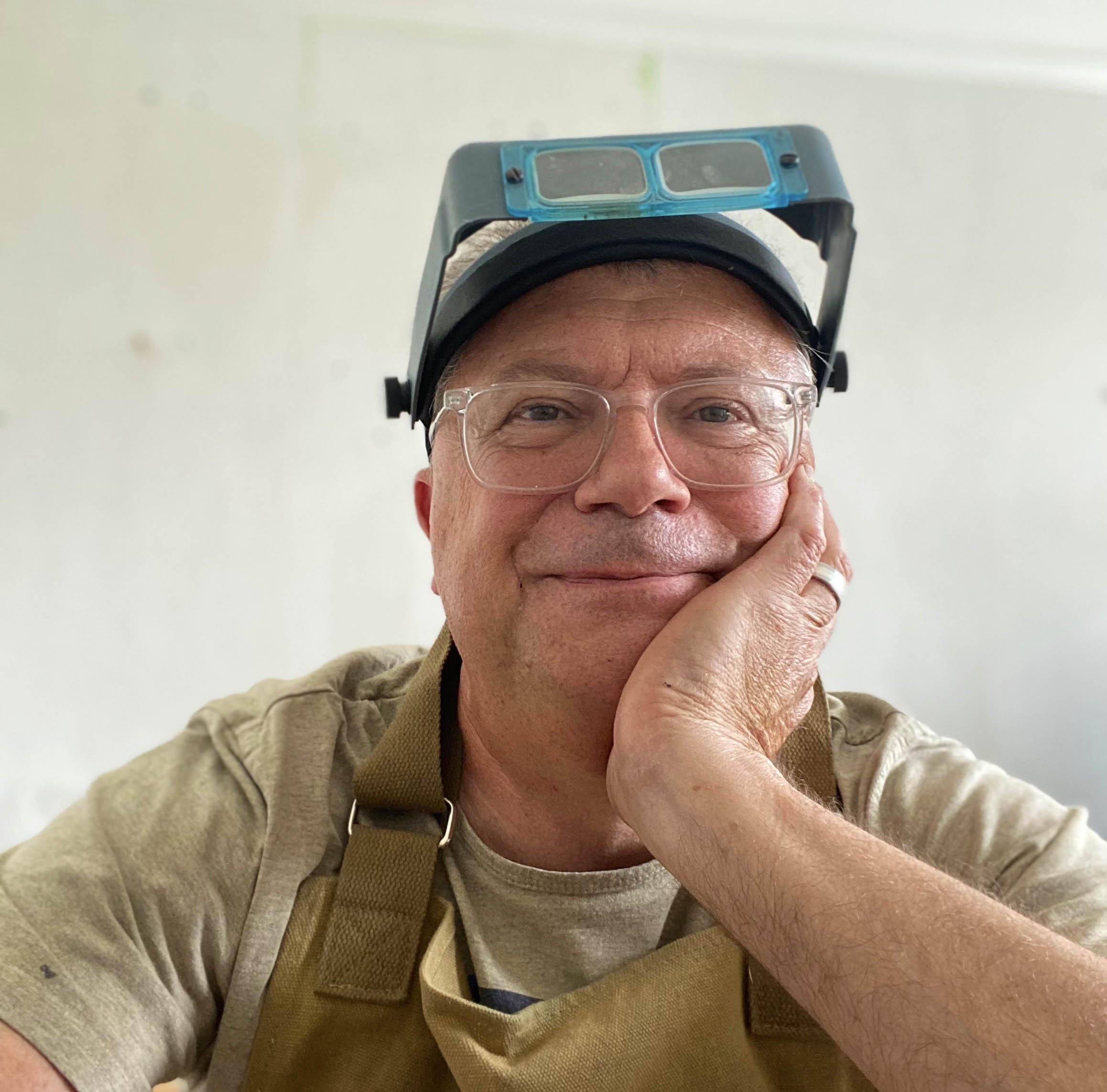A portrait photo of Stuart, the artist, silversmith and creator behind Sleek Silver Jewellery