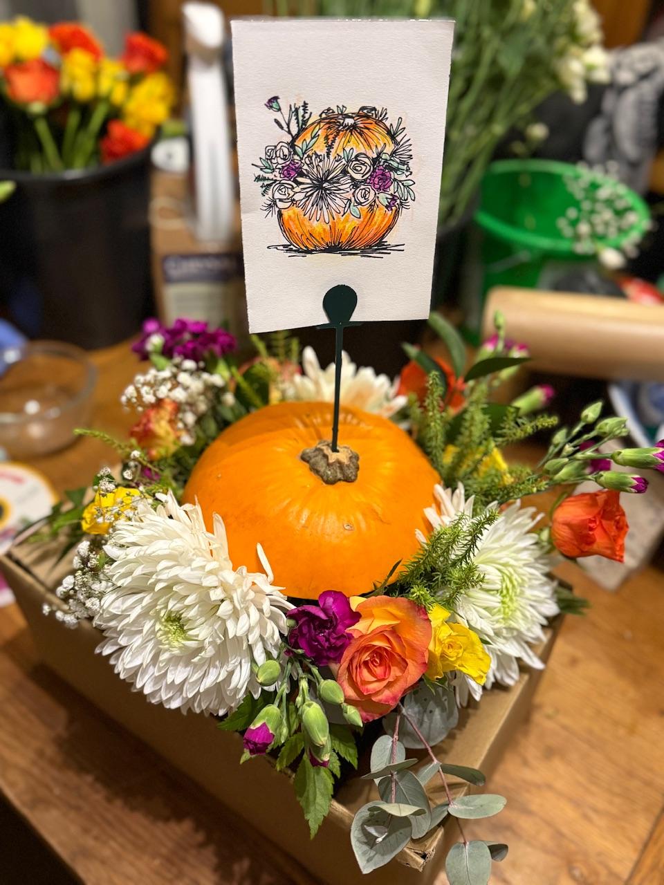 A bouquet with a hand drawn card
