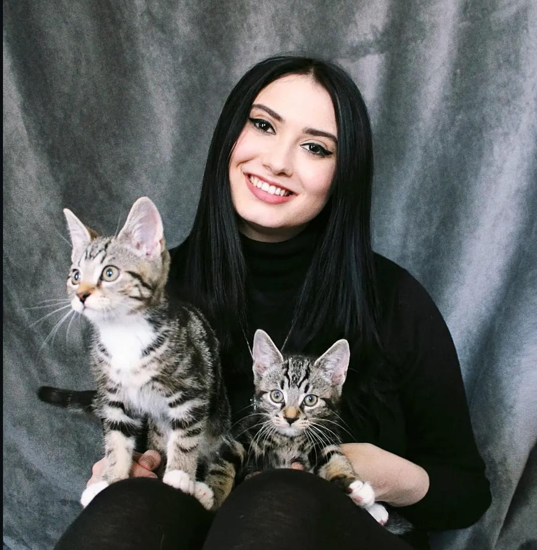 Image of Heather with two cats