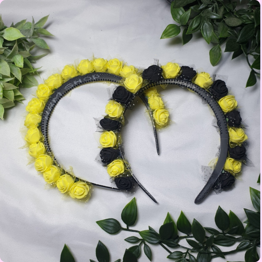 A yellow flower crown and black and yellow flower crown