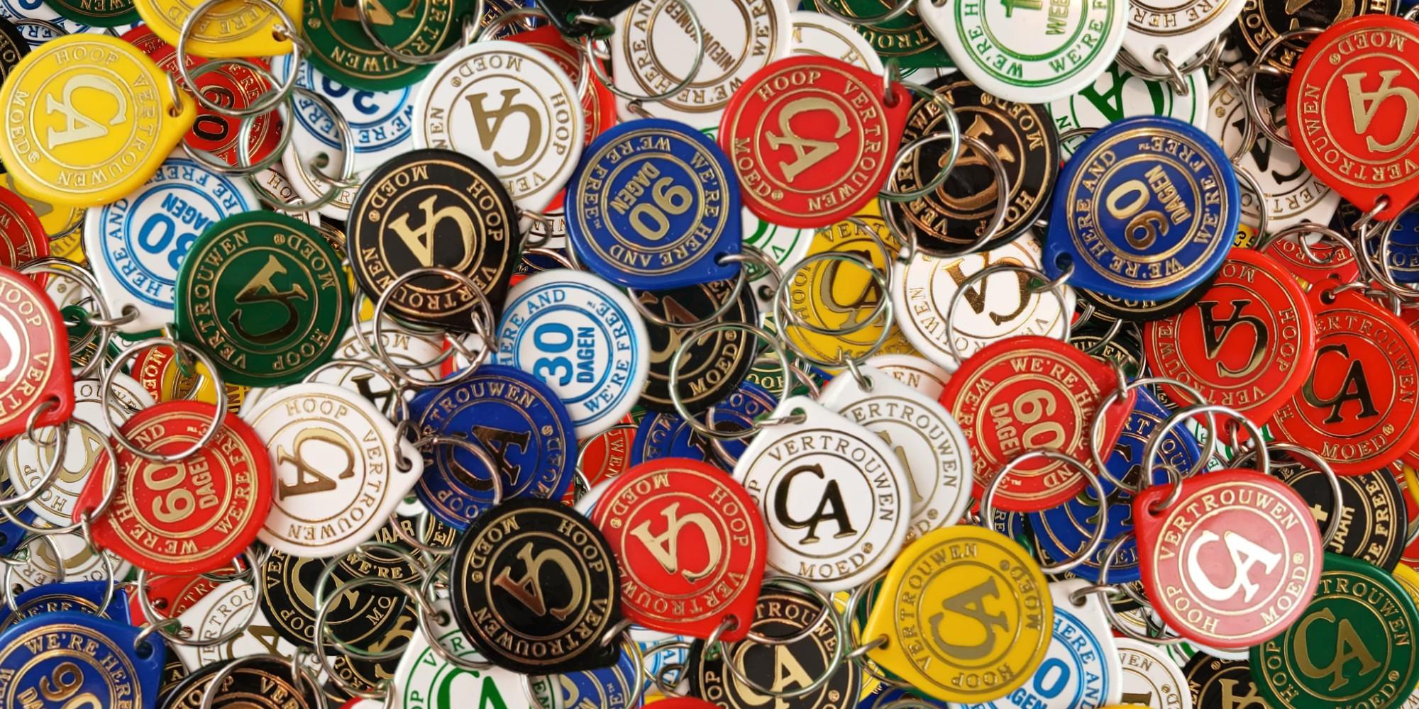 CA mijlpaal plastic coins