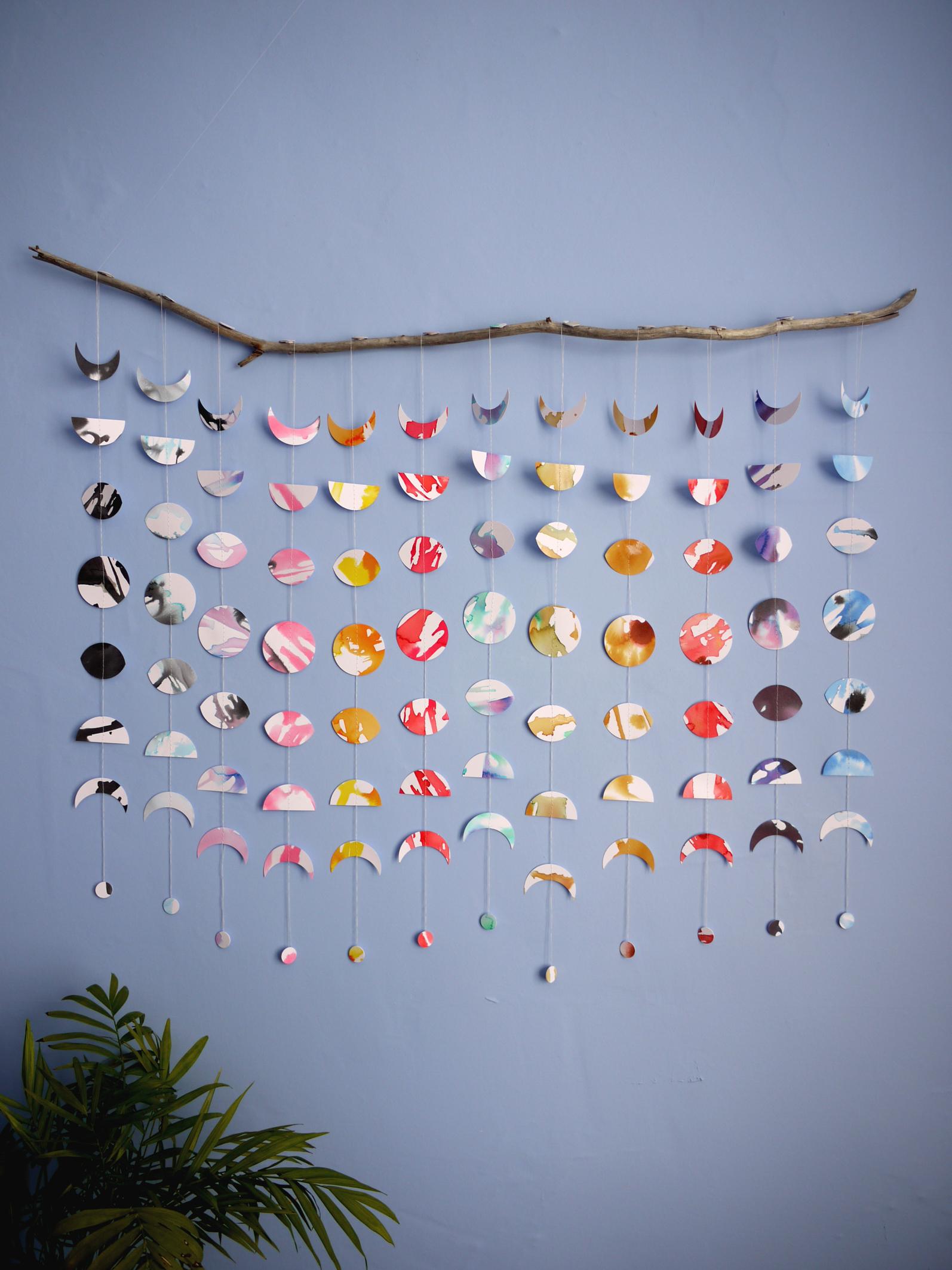 Mini moon phases garlands as a wall hanging to create celestial home decor
