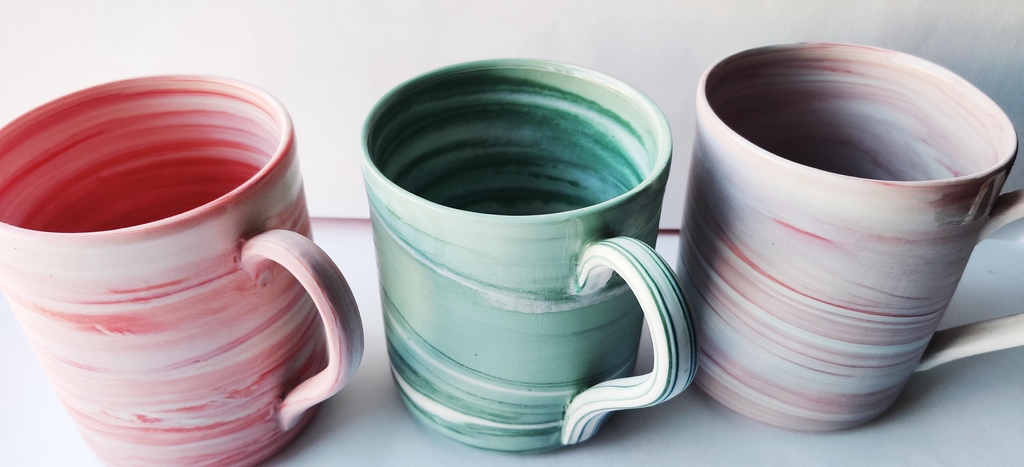 Coloured porcelain mugs