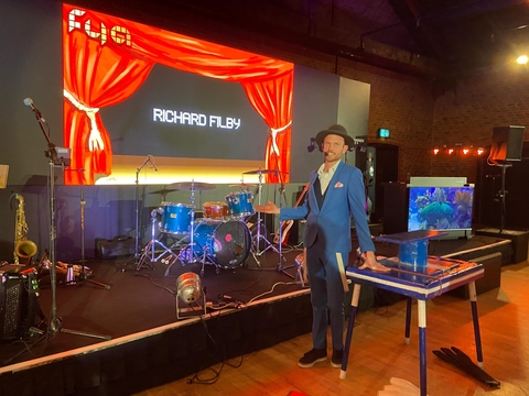 Richard Filby Standing in front of his Rola Bola