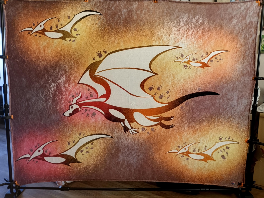 Blanket featuring art by Keena Kapu