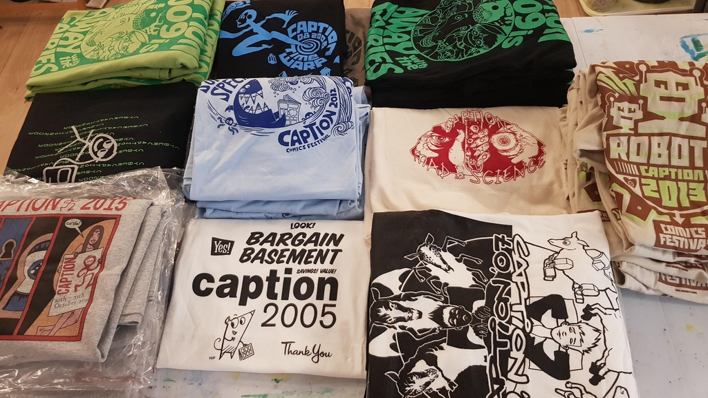 An array of Vintage Caption T-shirts with unique designs including "Time Warp", "Summer Special", "Bargain Basement", "Away with the Fairies", "Mad Science", and "Dreams & Nightmares".