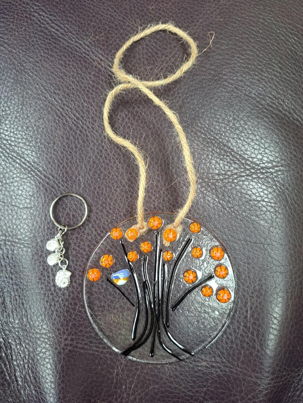 Silver keyring and fused-glass suncatcher made in a workshop