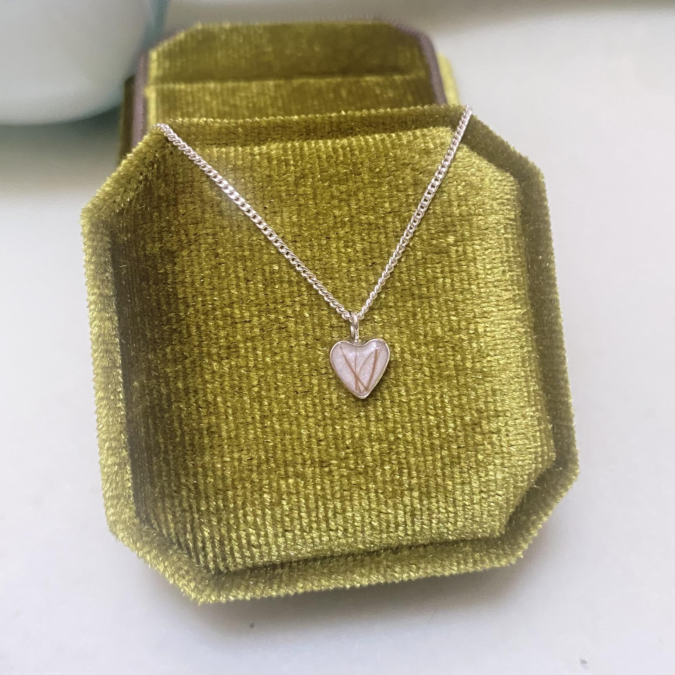 I occasionally create memorial and keepsake jewellery using personal materials such as breast milk, ashes, or hair. These pieces are made with care, respect, and sensitivity.
If this resonates with you, you're welcome to get in touch to ask questions or discuss a custom keepsake piece.