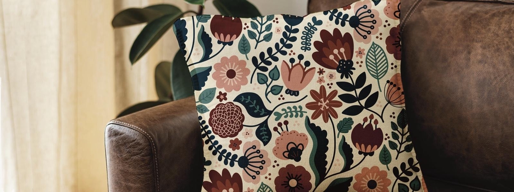 Scandi chintz fabric design on a cushion.