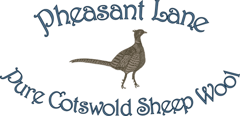 Sustainable wool blankets and scarves made from the wool of our own flock of rare breed Cotswold Sheep. The sheep live in Shropshire. Made in the UK