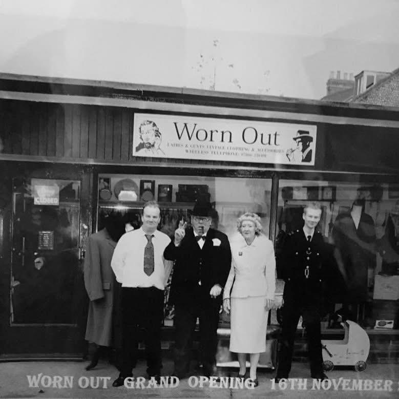 White slide with centred text reading: ‘Explore in-store or online at wornoutantiques.co.uk