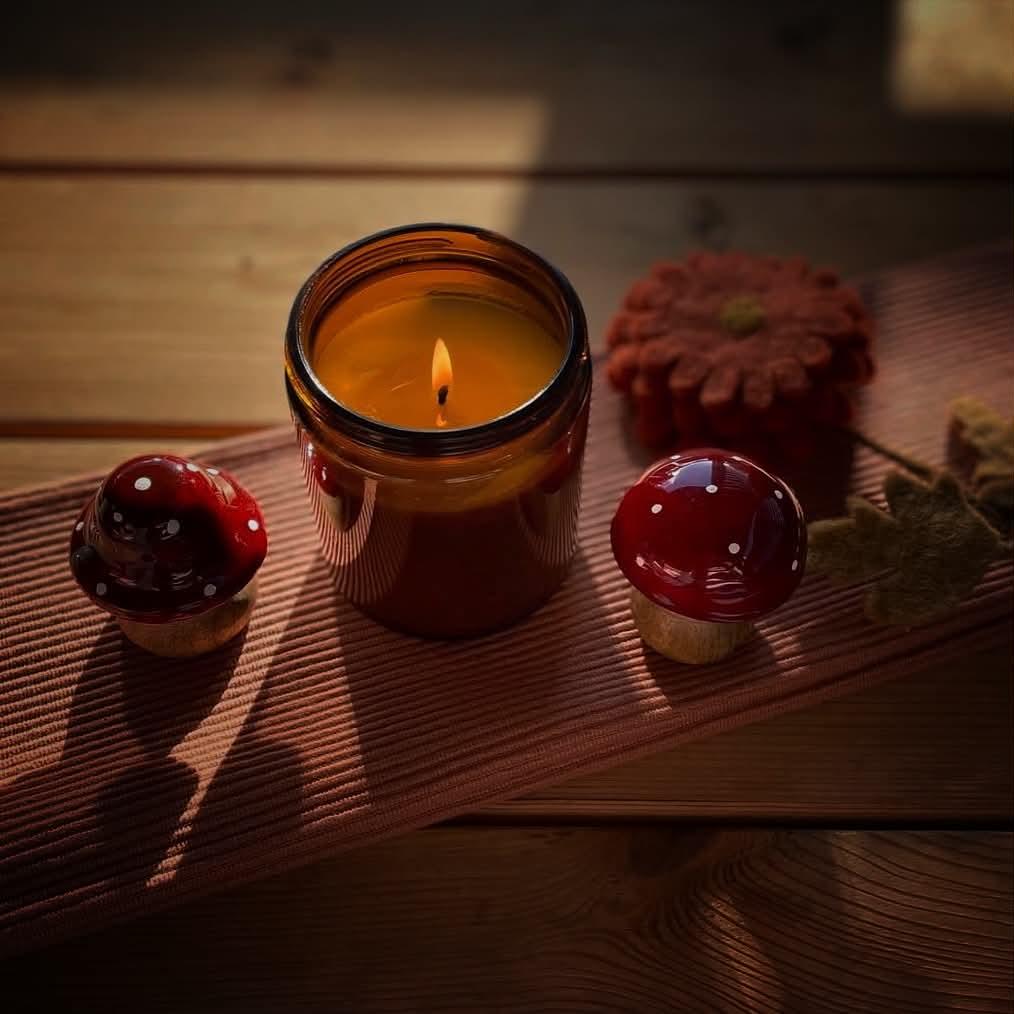 Two candles for £20. Candle is in a amber glass jar with natural soy candle shop on the label.