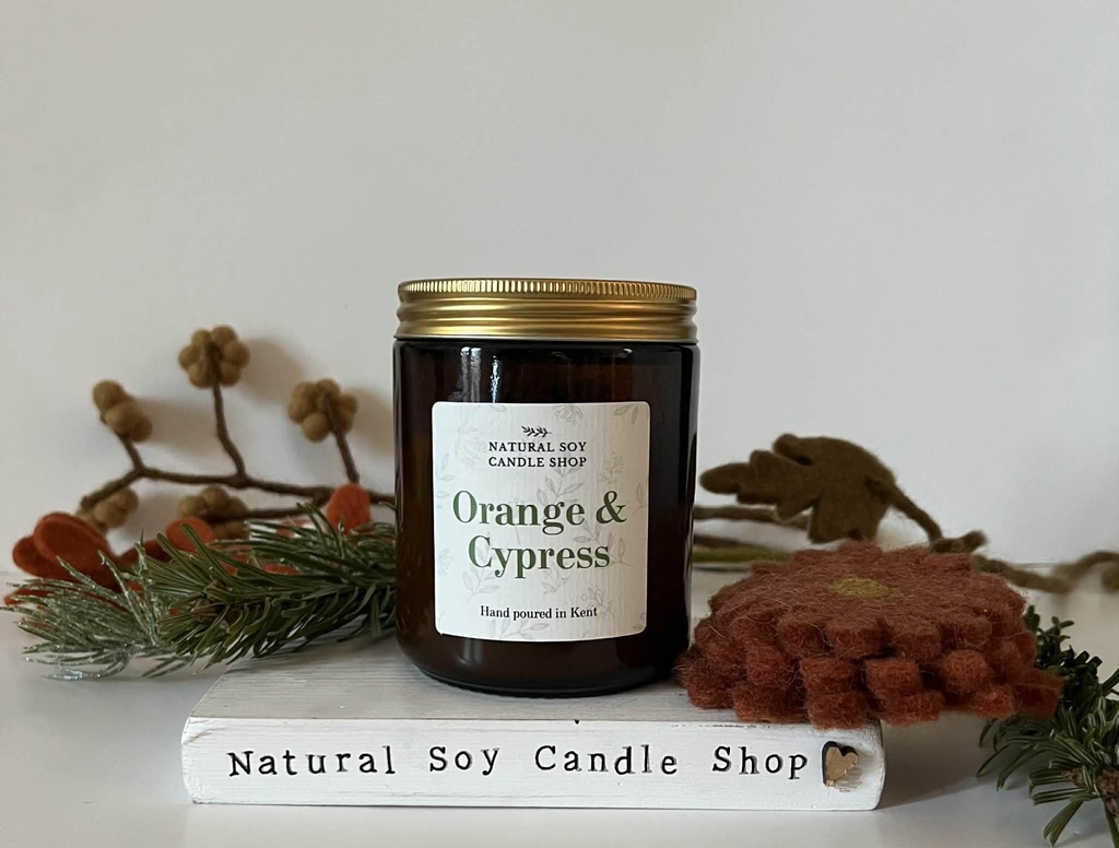Orange & Cypress Soy Candle in amber glass jar