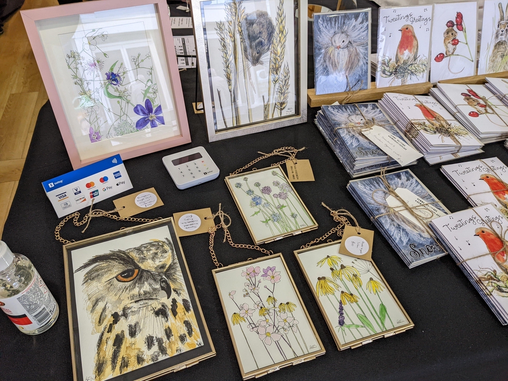 Some artwork framed on display